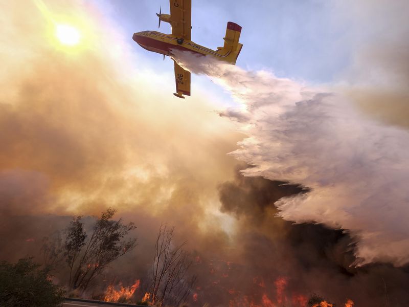 Air Tanker Pilots Help Keep Wildfires At Bay In California